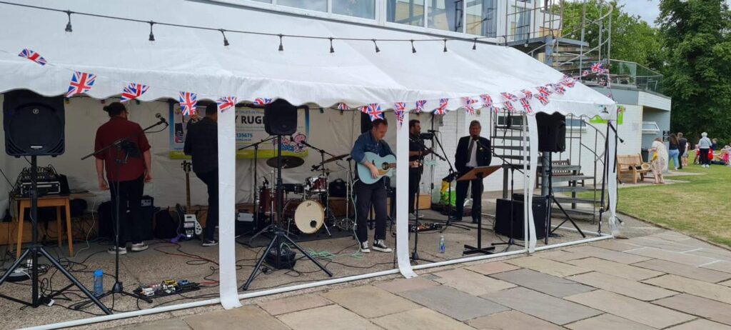 band playing outdoor venue